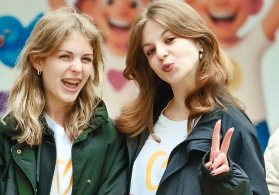 Two young volunteers at the RVC Center in Moldova.