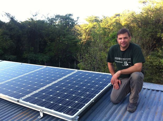 A GoVoluntouring volunteer installing solar panels in Nicaragua