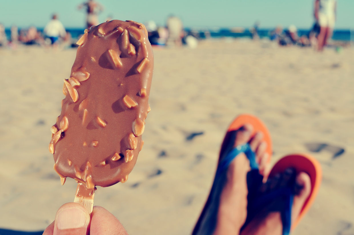 Eating a chocolate ice cream on the beach