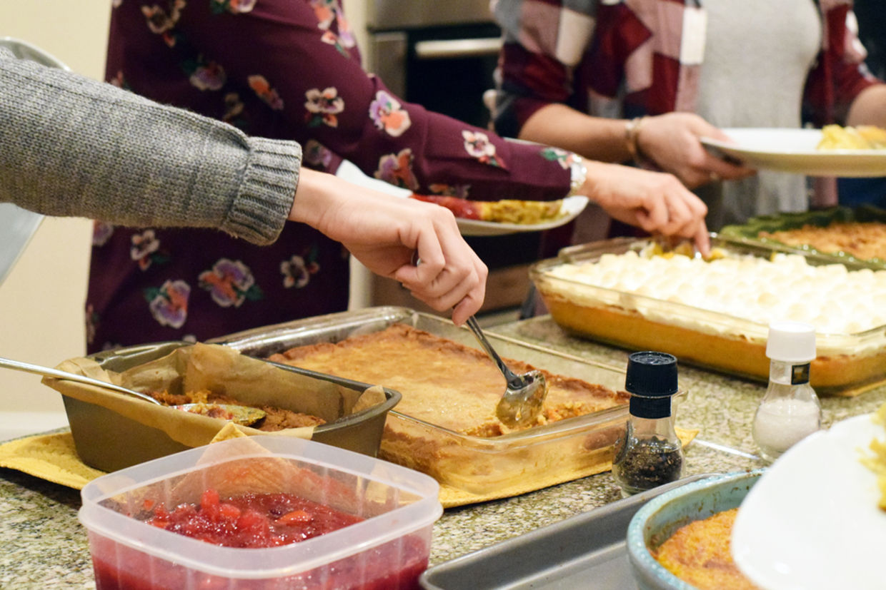 Get your social circle together to organize a potluck for those in need. (Shutterstock)