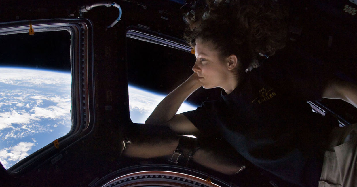 Caldwell Dyson in the Cupola module of the International Space Station observing Earth.