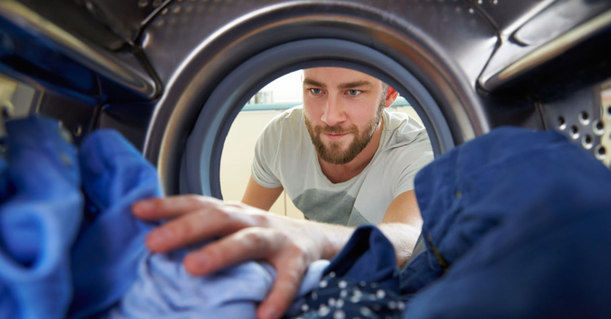 man doing laundry.