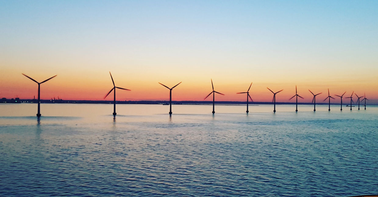 Windmills at sunset renewable energy