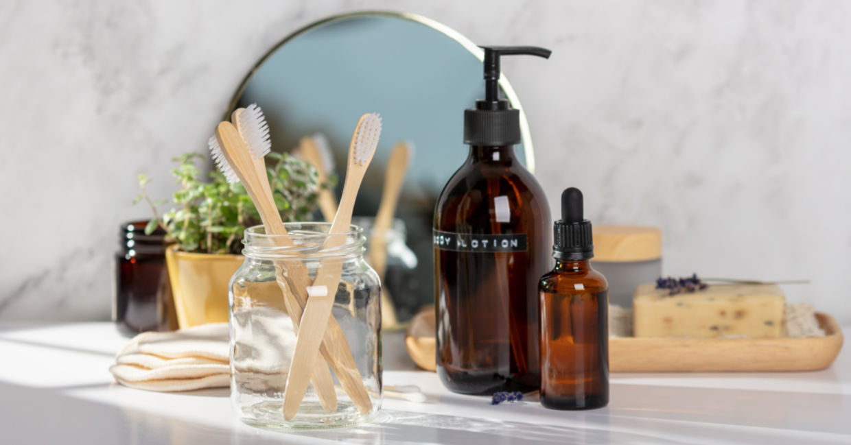 An eco-friendly bathroom with toothbrushes and DIY beauty products.