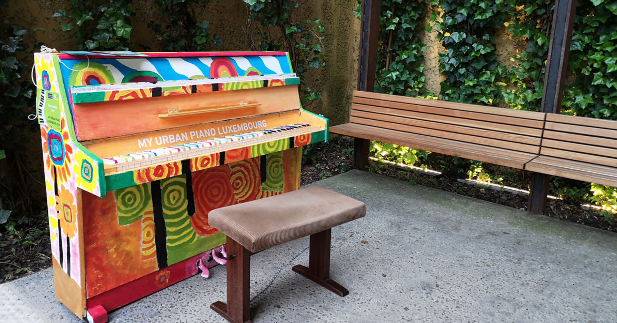 A piano in a park.