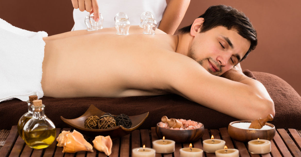 This man is getting a cupping treatment for wellness.