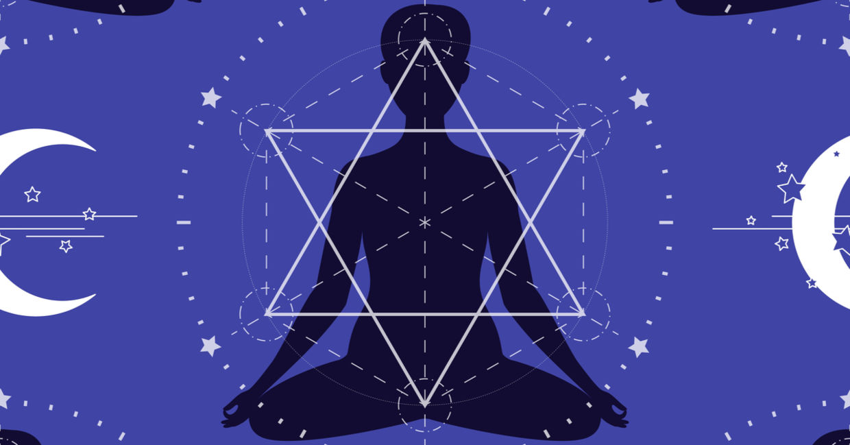 A lotus pose, showing the points of an interlocking triangle, a powerful shape in sacred geometry.