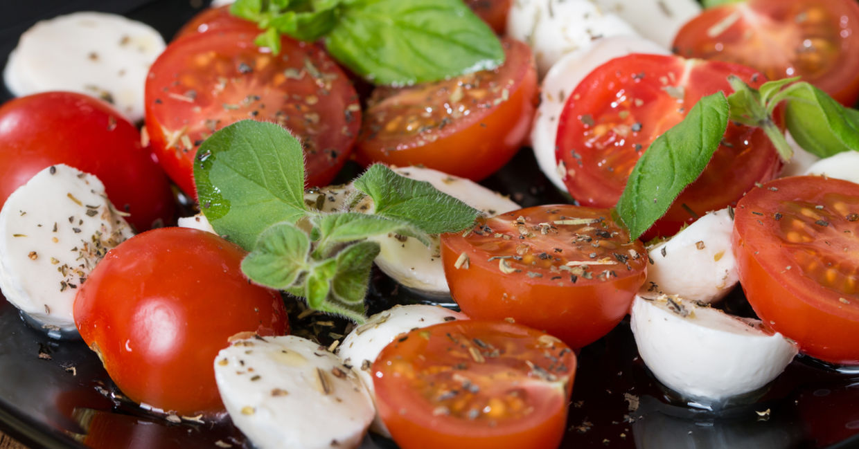 Italian Caprese salad with a mix of tomatoes and low-fat mozzarella