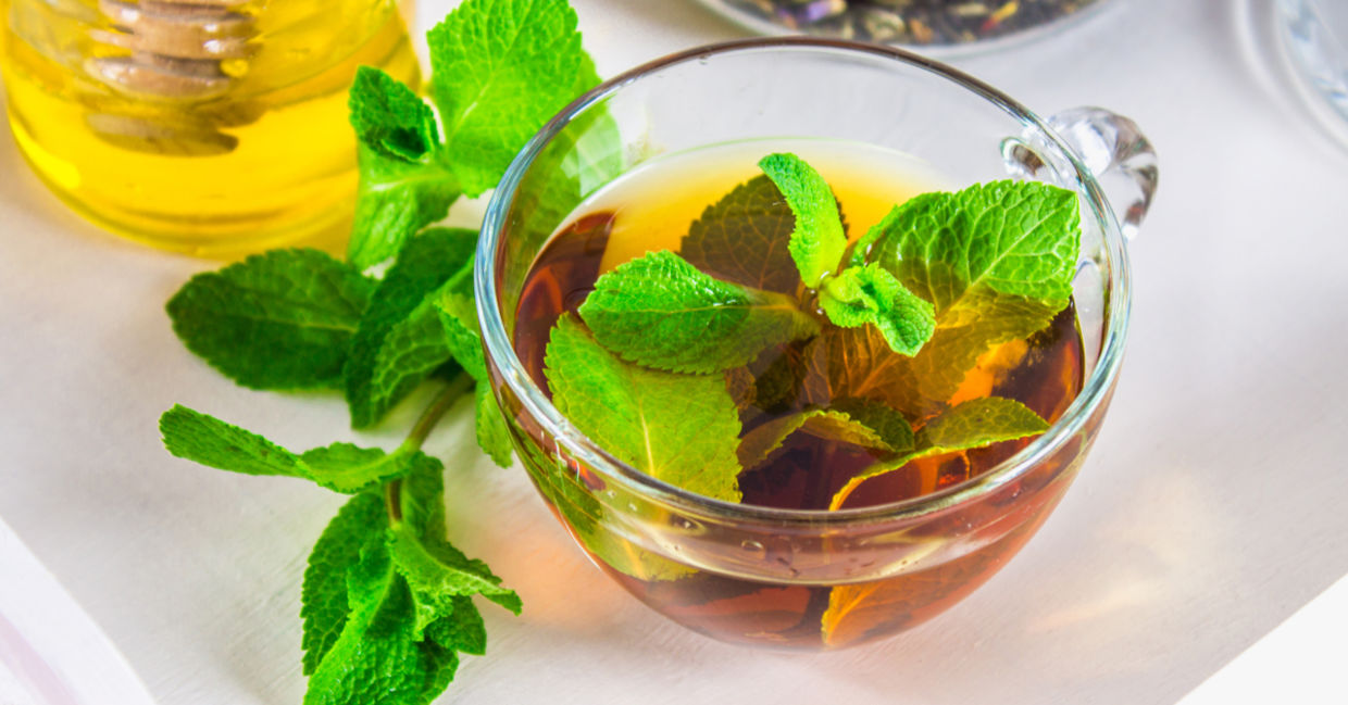 A cup of peppermint herbal tea.