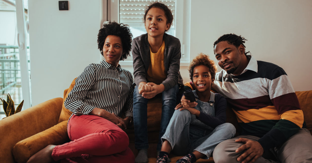 a family watching a movie together during Black History Month.