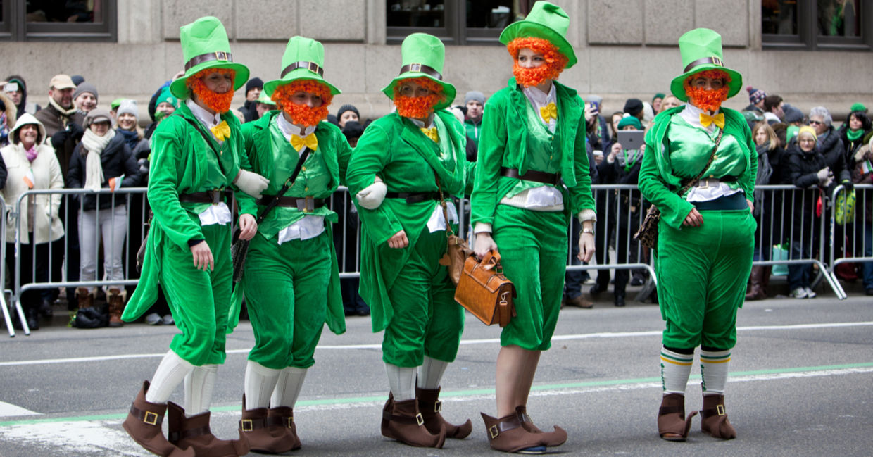 Dressing up as green leprechauns at the St.Patrick's Day parade in New York City.