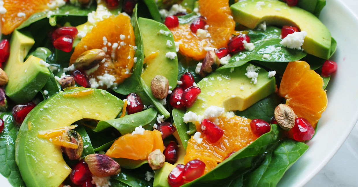 Close-up of spinach and avocado salad.