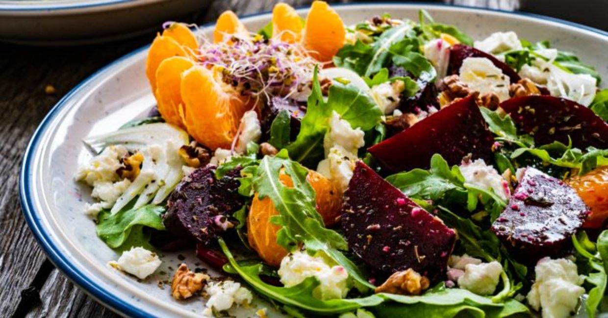 Salad with beets, walnuts, feta cheese and mandarins.