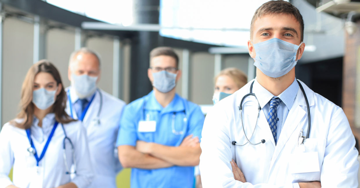 Photo of a group of doctors happy to help others.