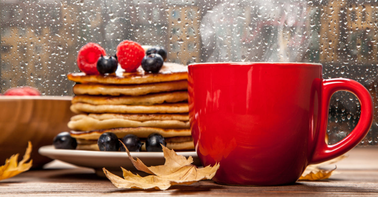Enjoying a plate of pancakes and a mug of steaming coffee is a gezellig way to spend a rainy day.