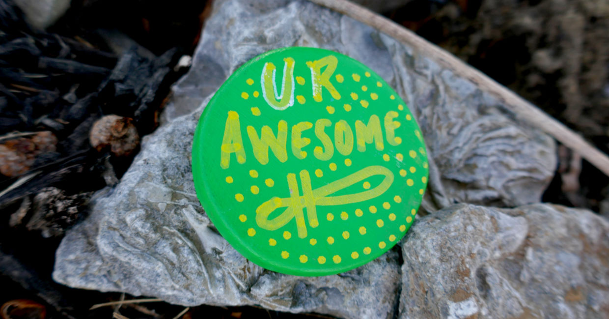 Kindness rock with uplifting message.
