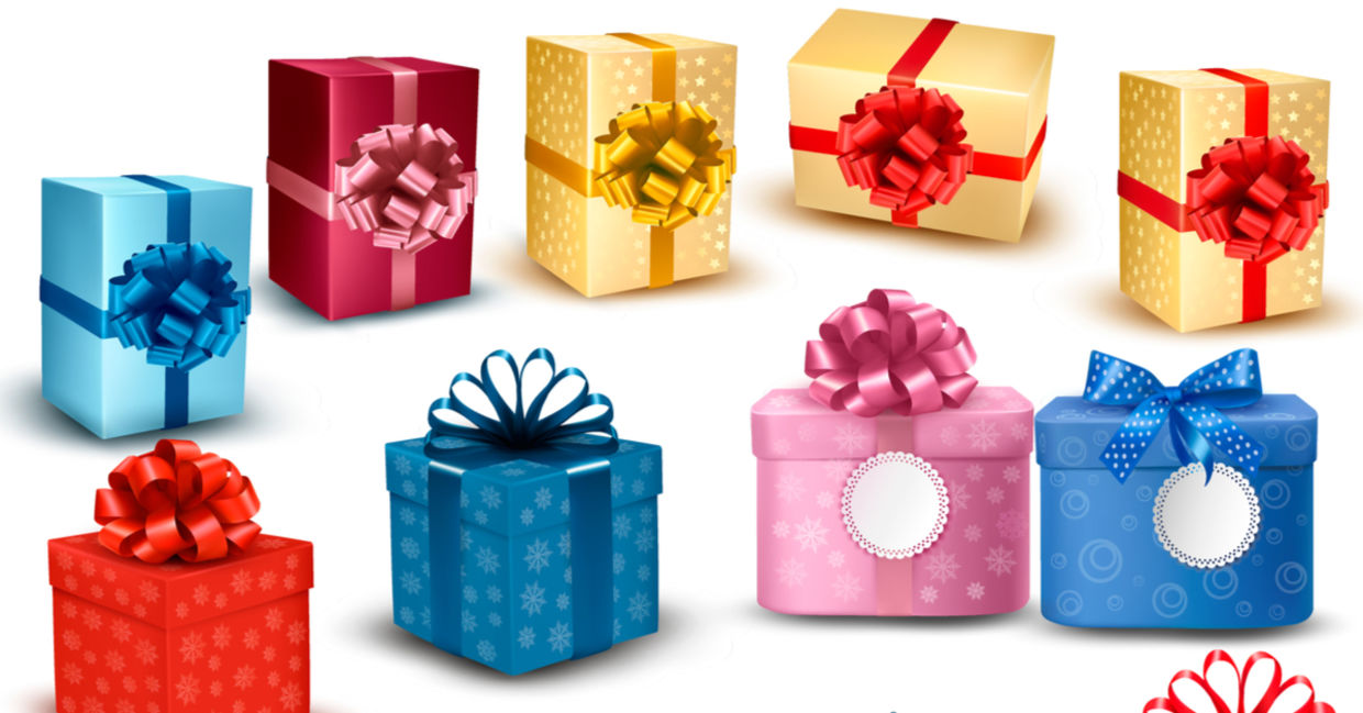 An assortment of upcycled gift boxes with bows.