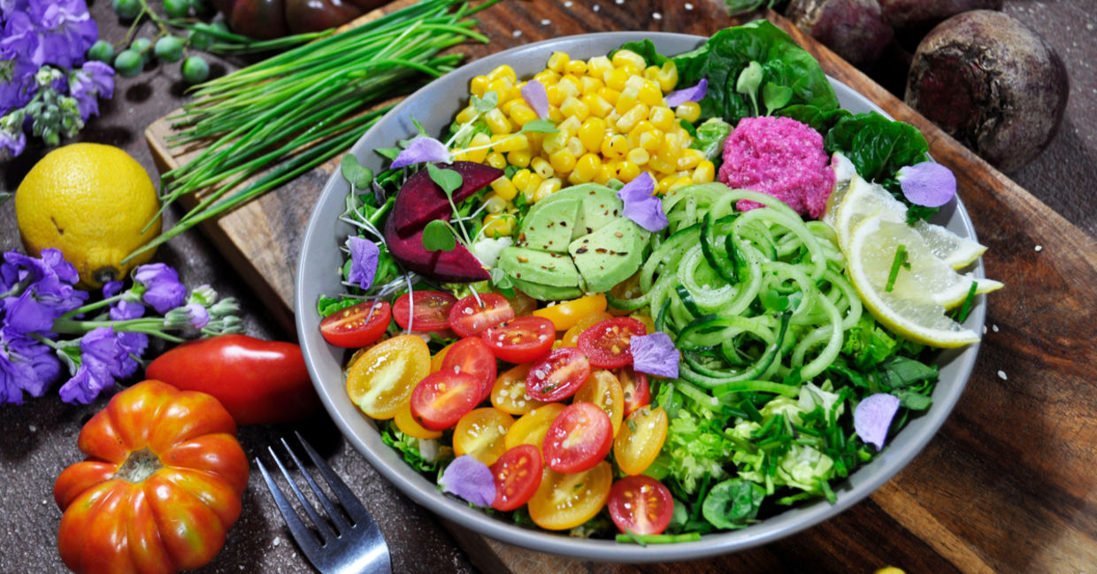 A rainbow salad showcasing plant-based food.