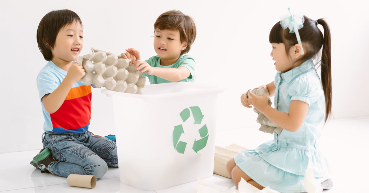 Children taking care of the planet by recyling.