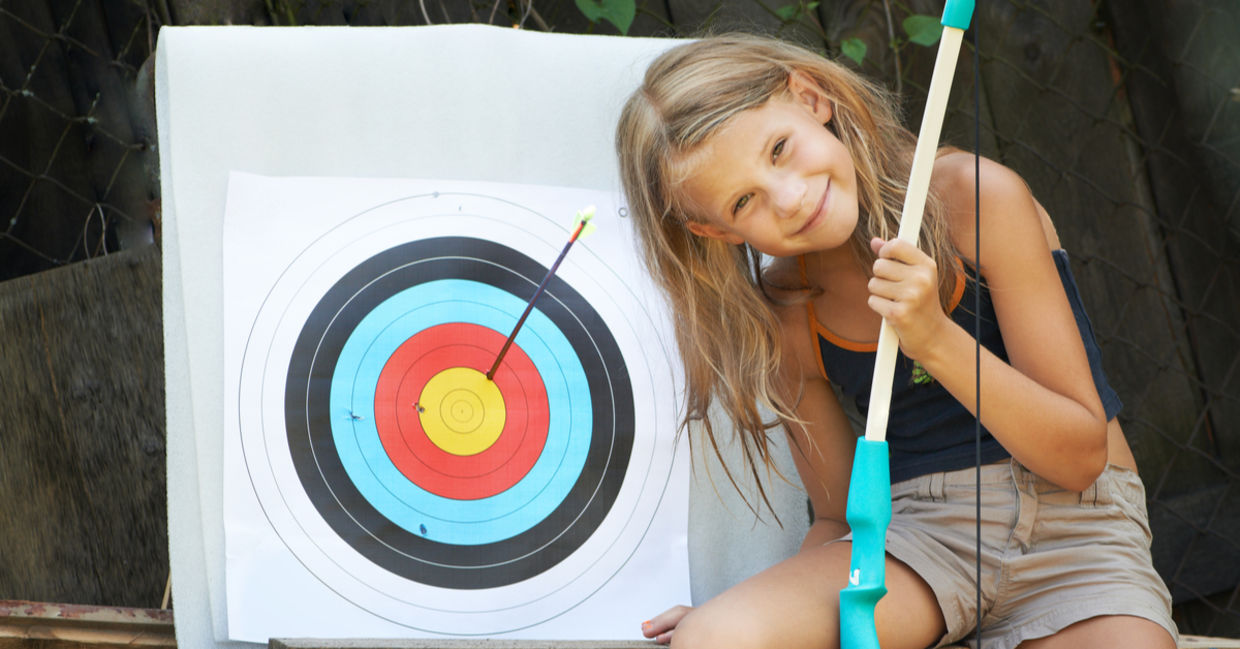 Children improve hand eye-eye coordination by doing archery.