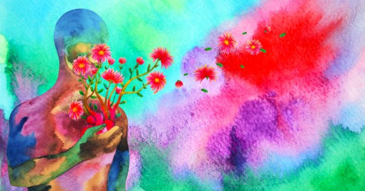 Compassion expressed in a watercolor painting of a human red heart healing flower.