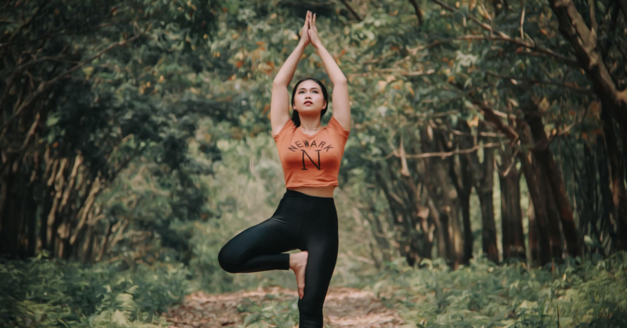 The tree pose channels energy to the crown chakra.