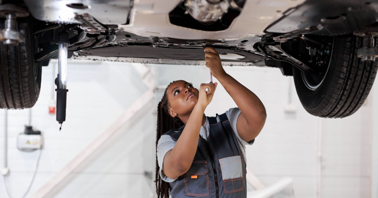 A female car mechanic at work.