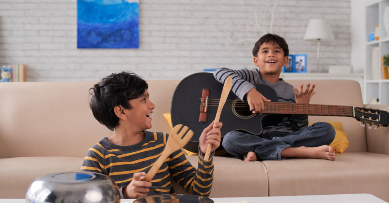 Kids enjoying music at home.