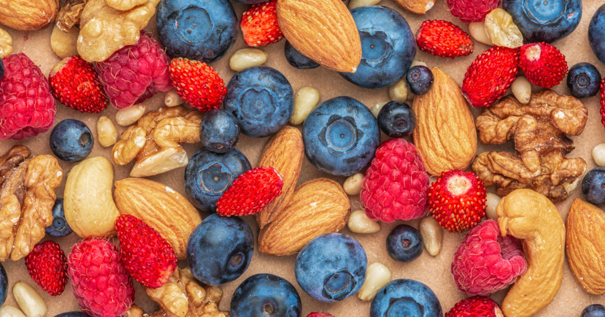 Nuts and berries are healthy foods to eat daily.