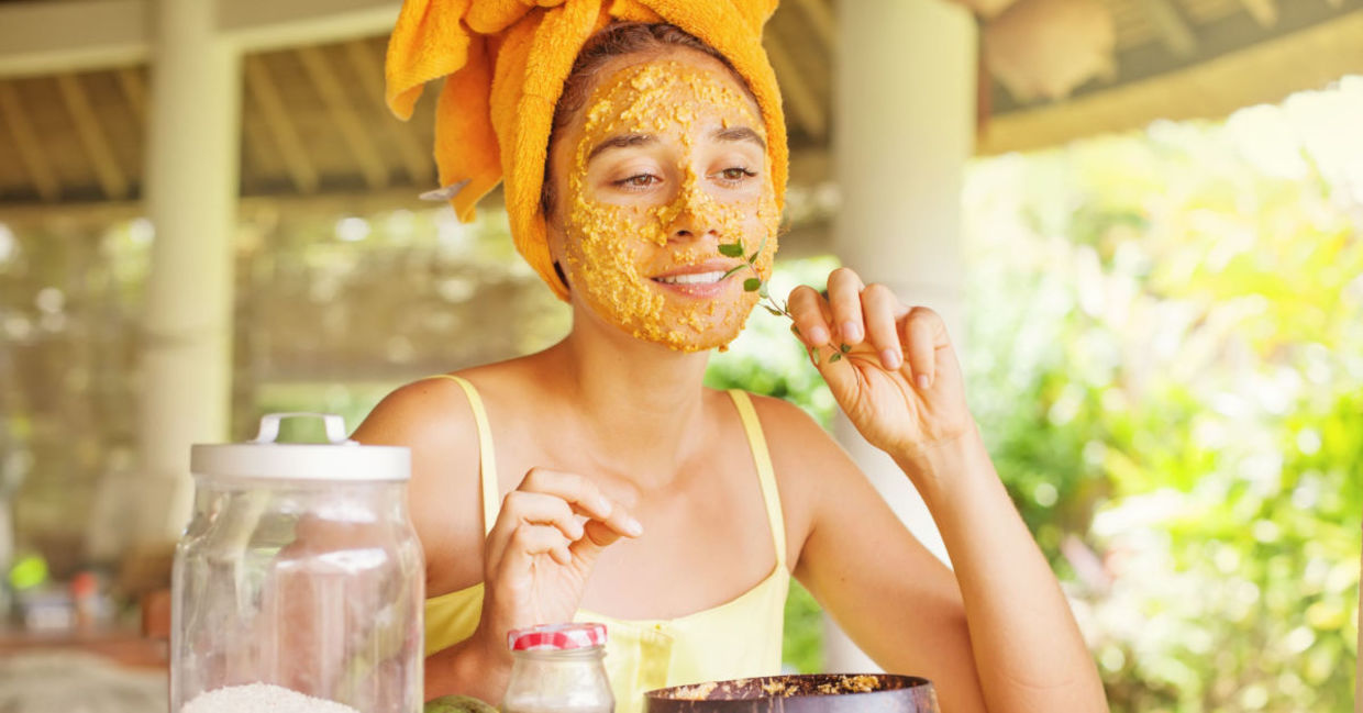 Using a DIY facial mask.