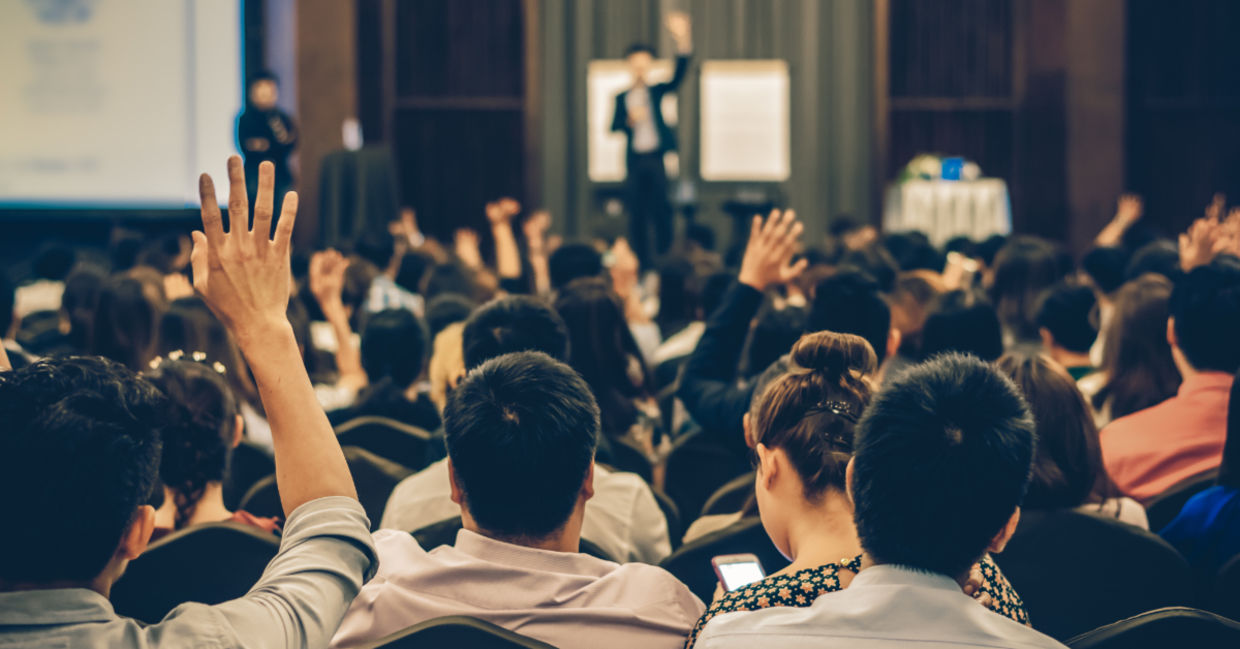 A lecture in a conference hall.