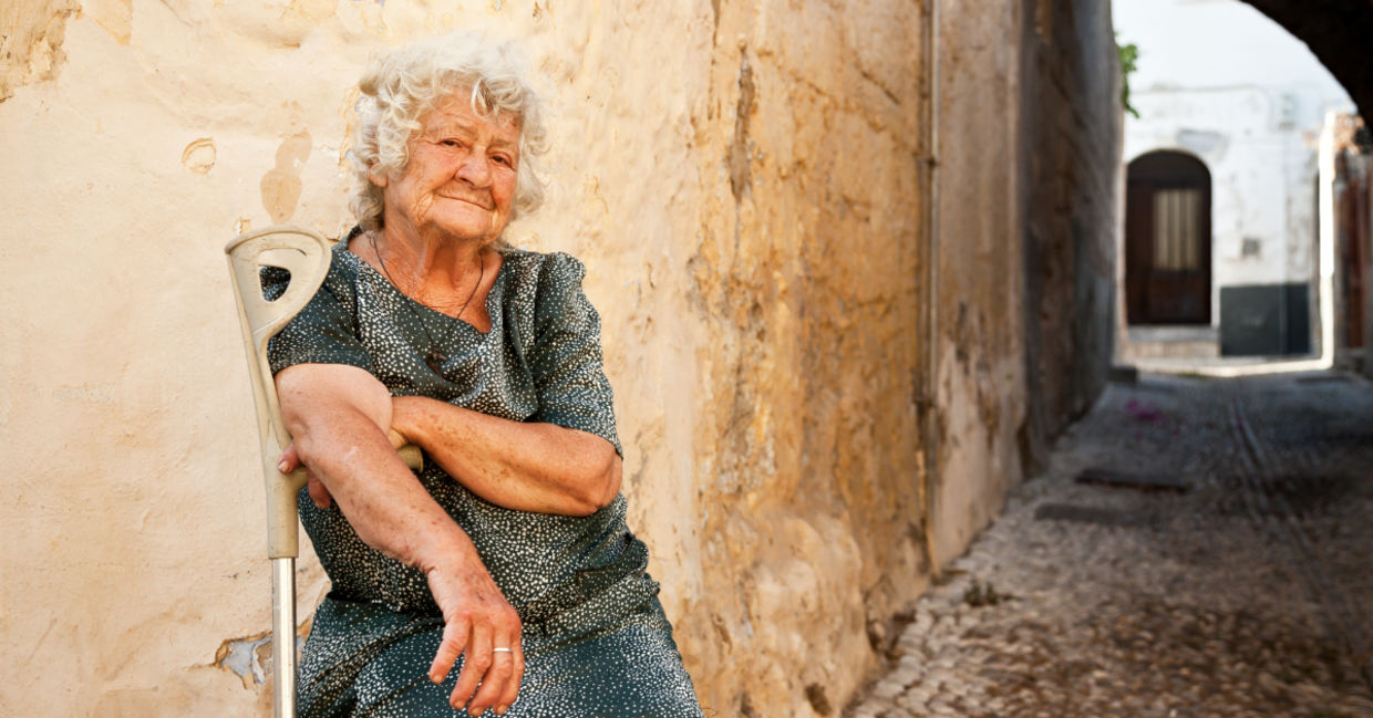 Senior woman soaking up some vitamin D in Greece.