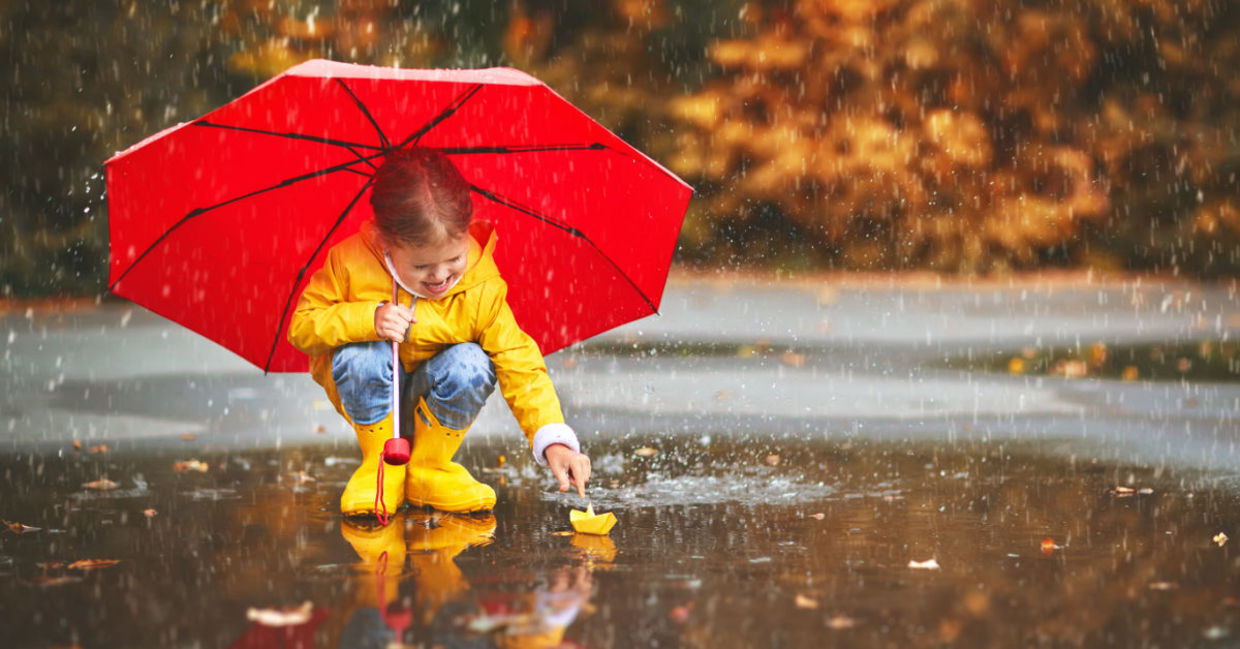 Playing in the puddles during a springtime rain.