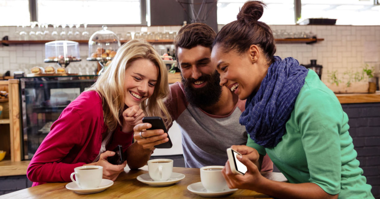 Three friends having coffee together.