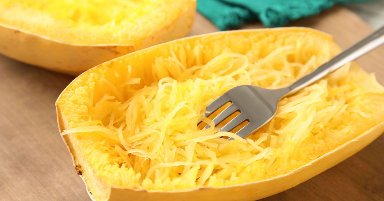 Preparing spaghetti squash.