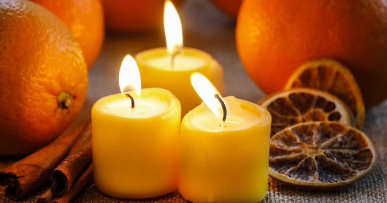 Lift your mood with an orange scented candle.
