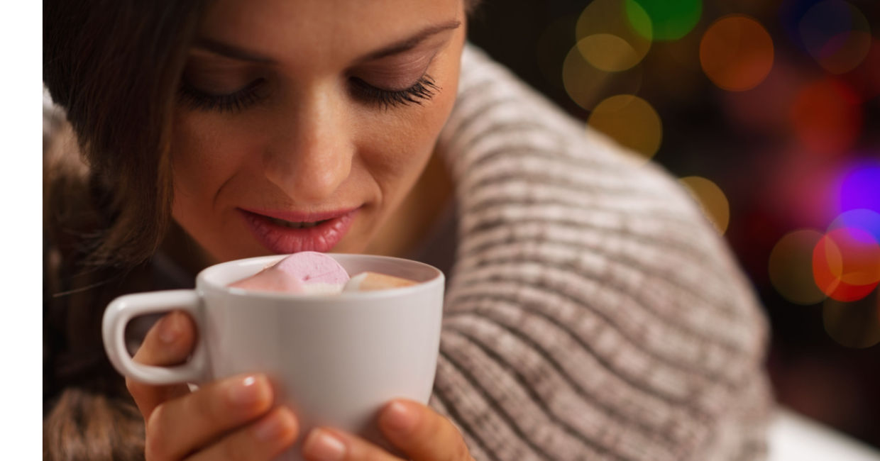 Enjoying a hot cocoa on a cold day.