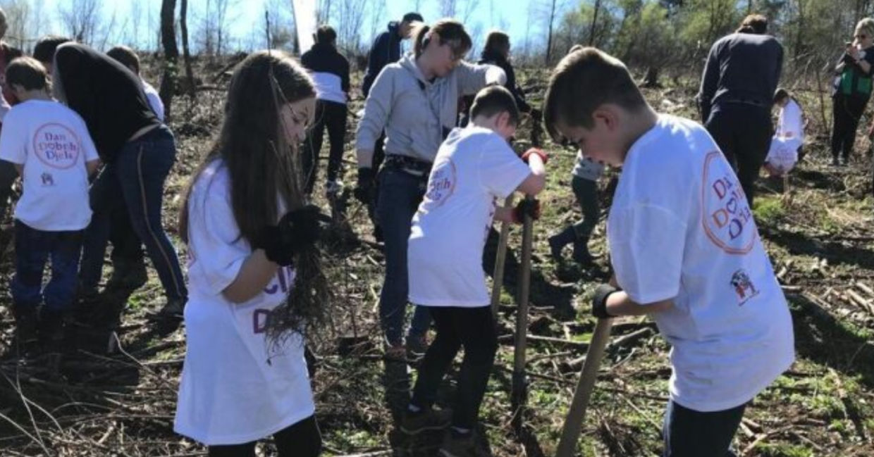Children in Croatia planting trees.