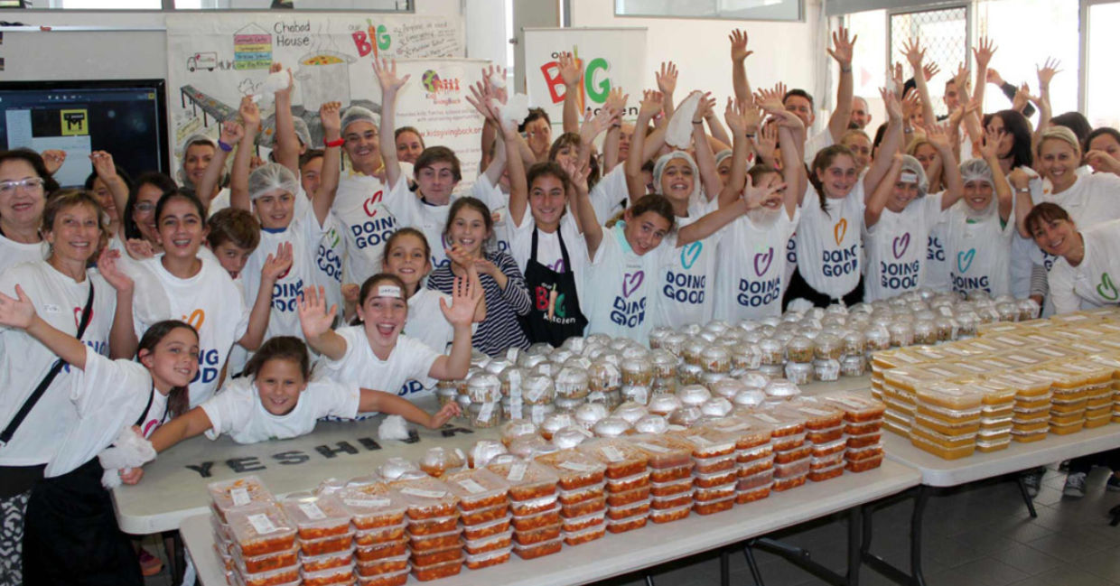 Families in Australia prepare food for needy people.