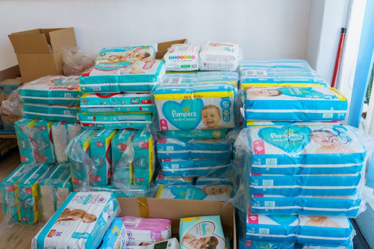 Collecting diapers for refugees.