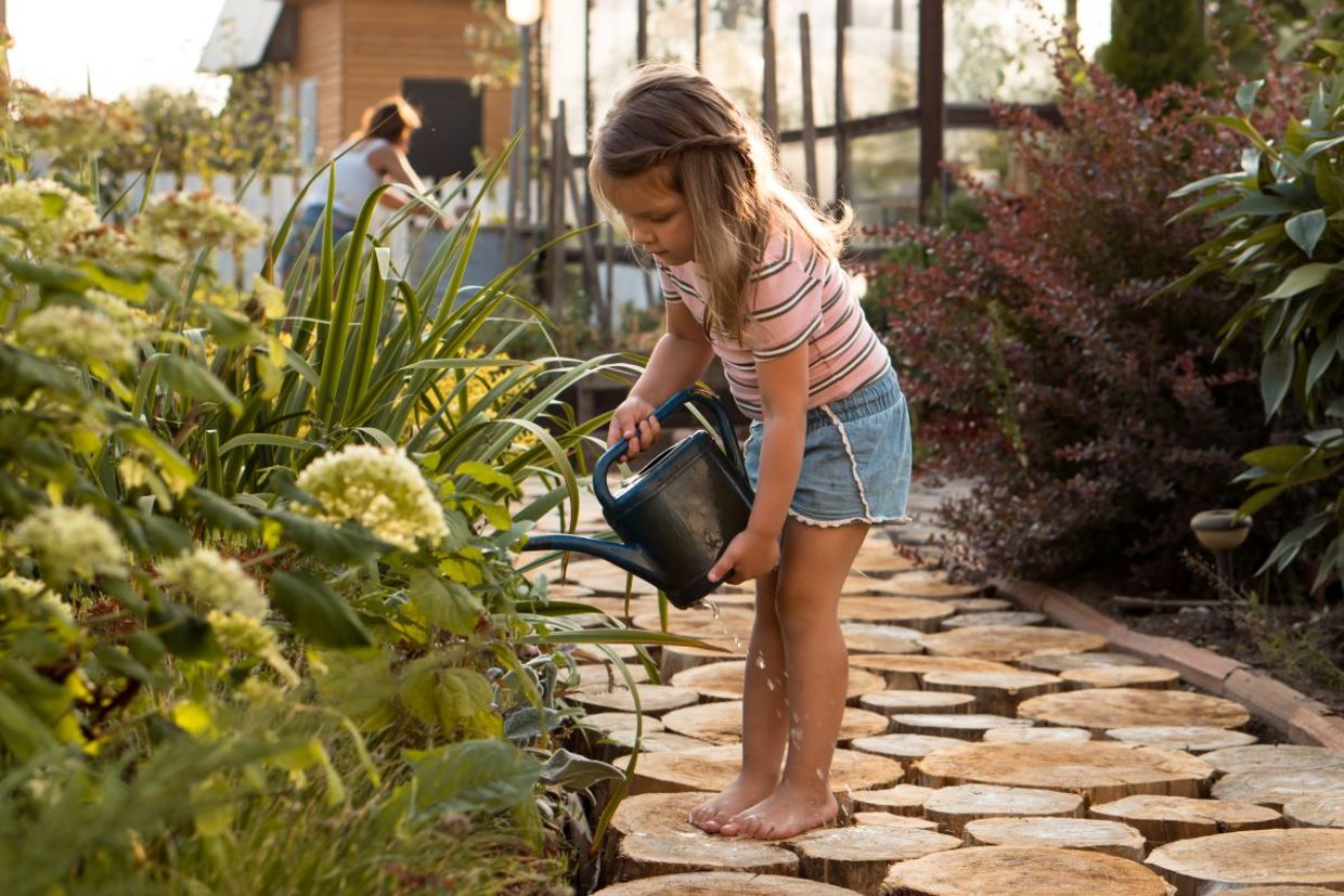 Watering plants in the garden.