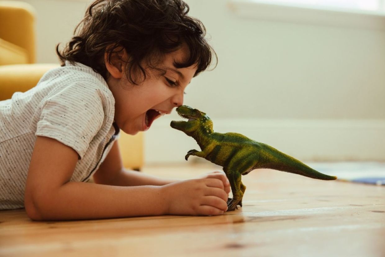 A TikTok trend has people gobbling up leafy greens dinosaur style.