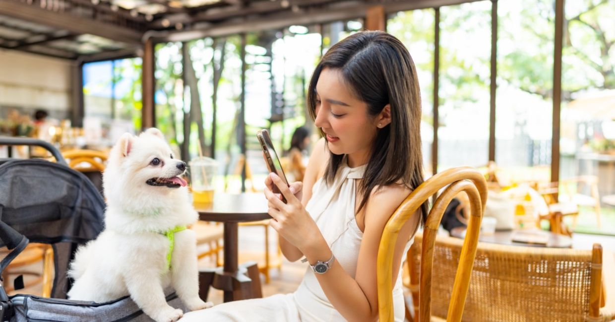 Pet parent posting a picture of having lunch with her baby.