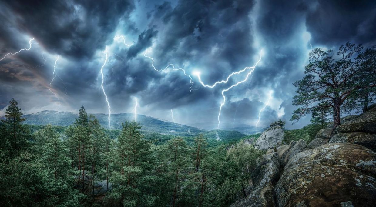 Lightning strikes in the mountains.