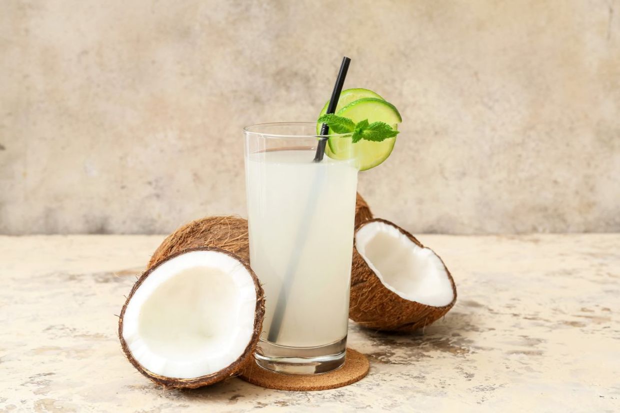 A glass of fresh coconut water.