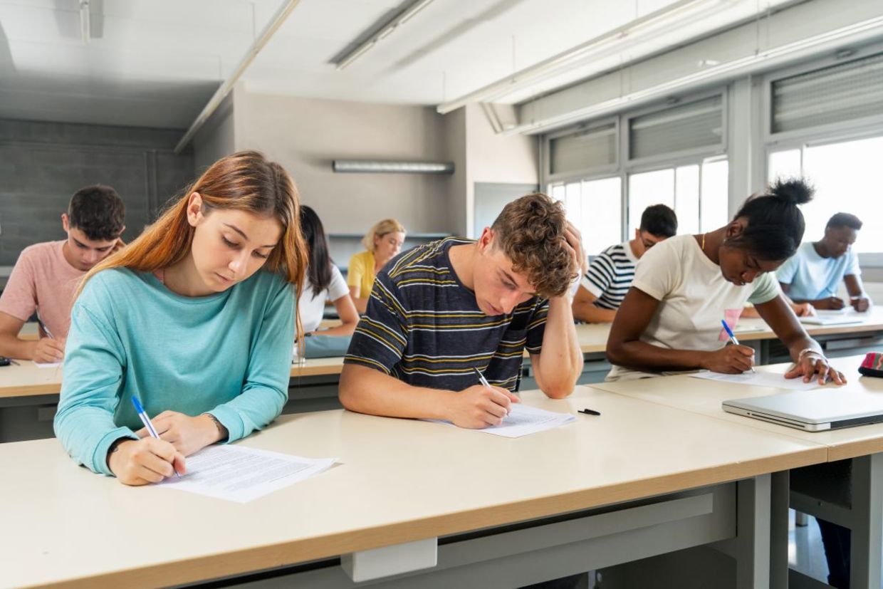 Students taking an exam.