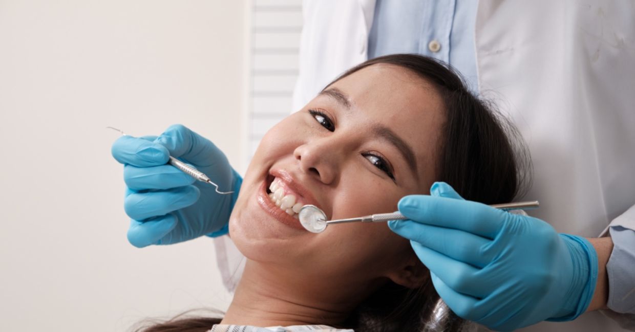 A woman at a dental appointment.