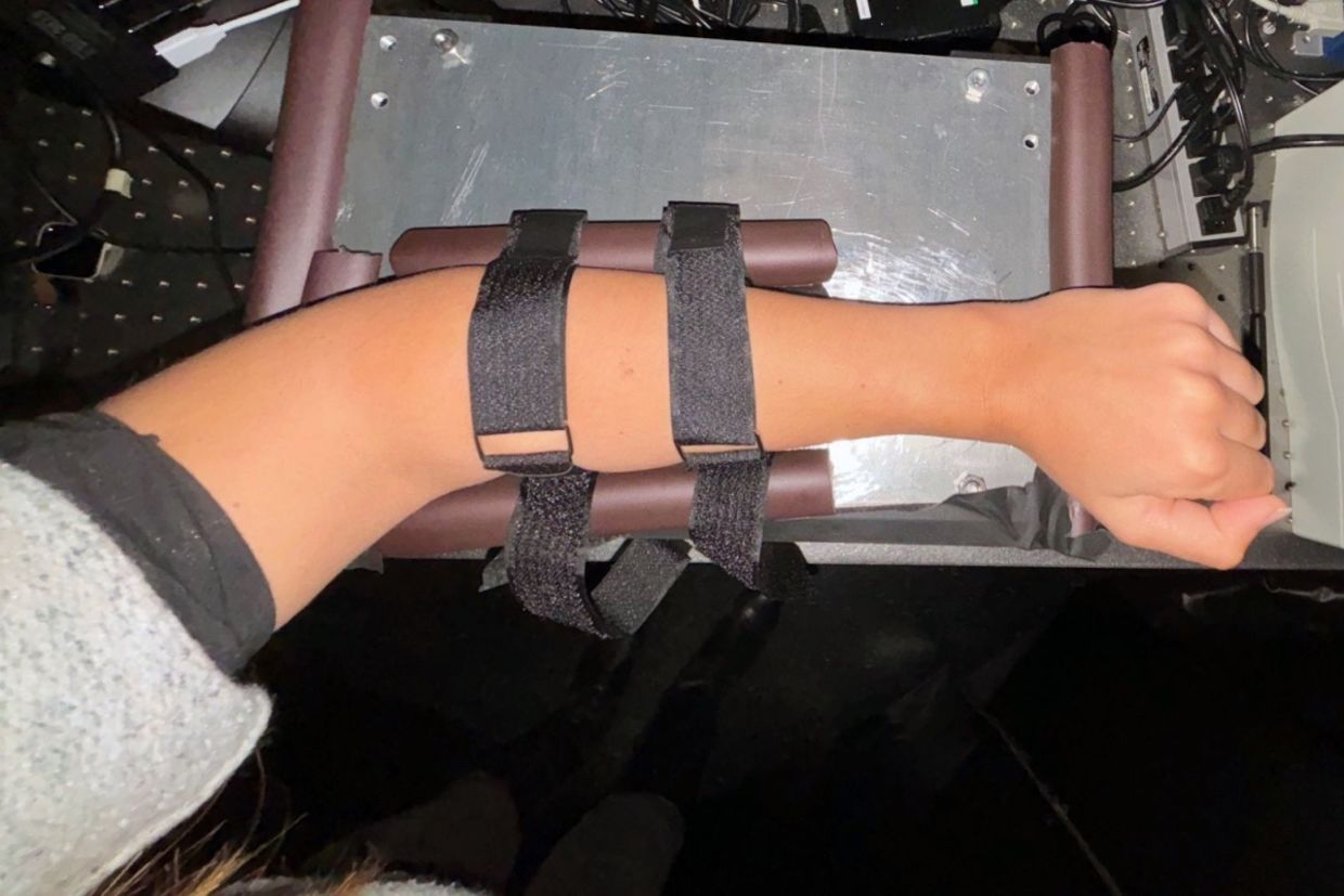 A doctor checks a patient’s blood sugar level.