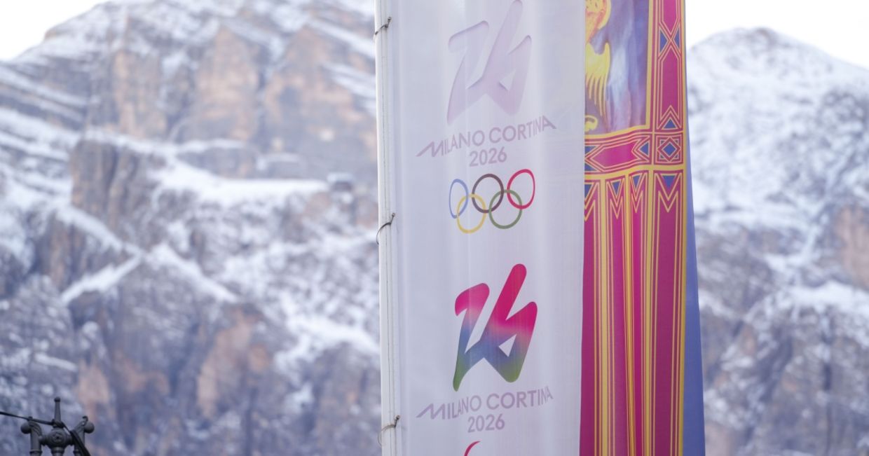 Coerina D'Ampezzo, Italy with Olympic flag.