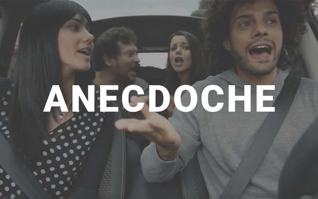 photo Four people inside a car all talking animatedly at once — a driver and passenger in front, two people in the back seat — each appearing to speak without listening to the others, with the word 'ANECDOCHE' displayed in large white capital letters across the center of the image.